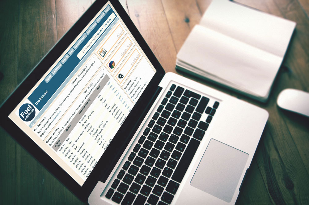 MOTText dashboard shown on a laptop